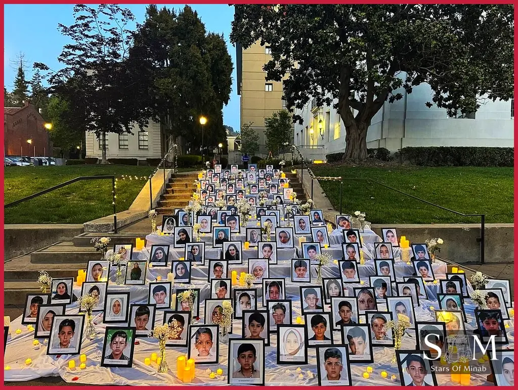A beautiful display of tuberoses and candles at the UC Berkeley Minab memorial